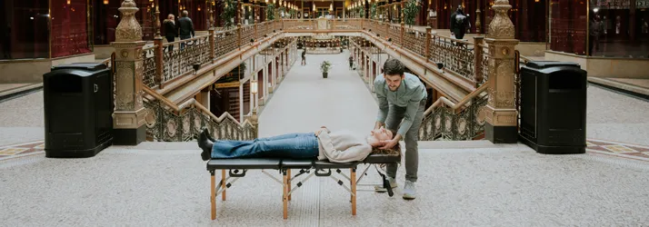 Chiropractor Cleveland OH Andy Ingram Adjusting Child In Museum